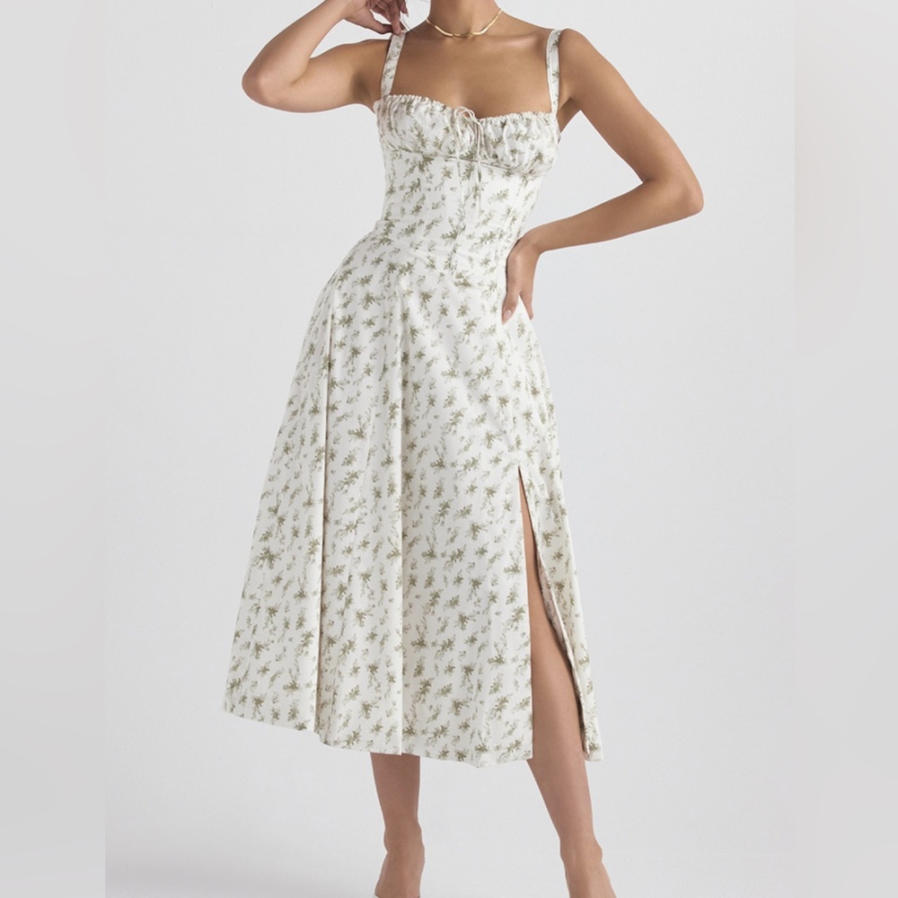Ladies sleeveless midi Dress with side slit.